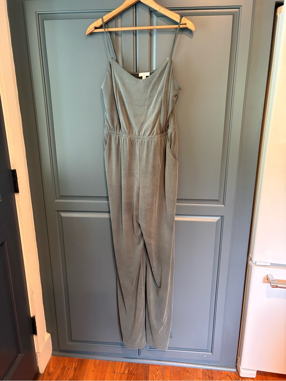 wide-leg jumpsuit in a muted sage green
